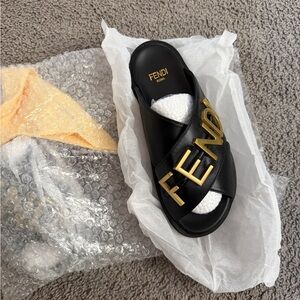 Fendi Black Slides with Gold Logo